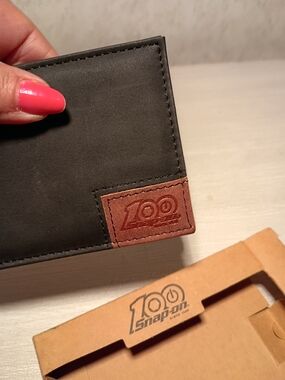 Snap-on Men's Black Bi-Fold Wallet with Brown Accent